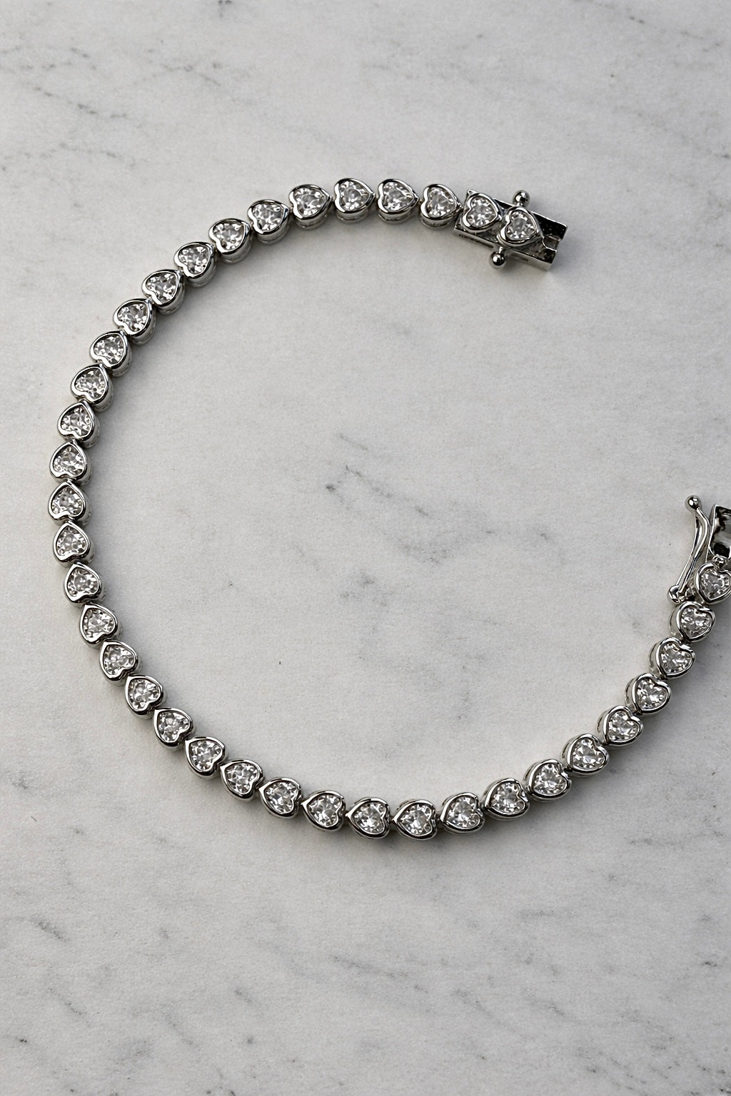 Dainty heart silver tennis bracelet