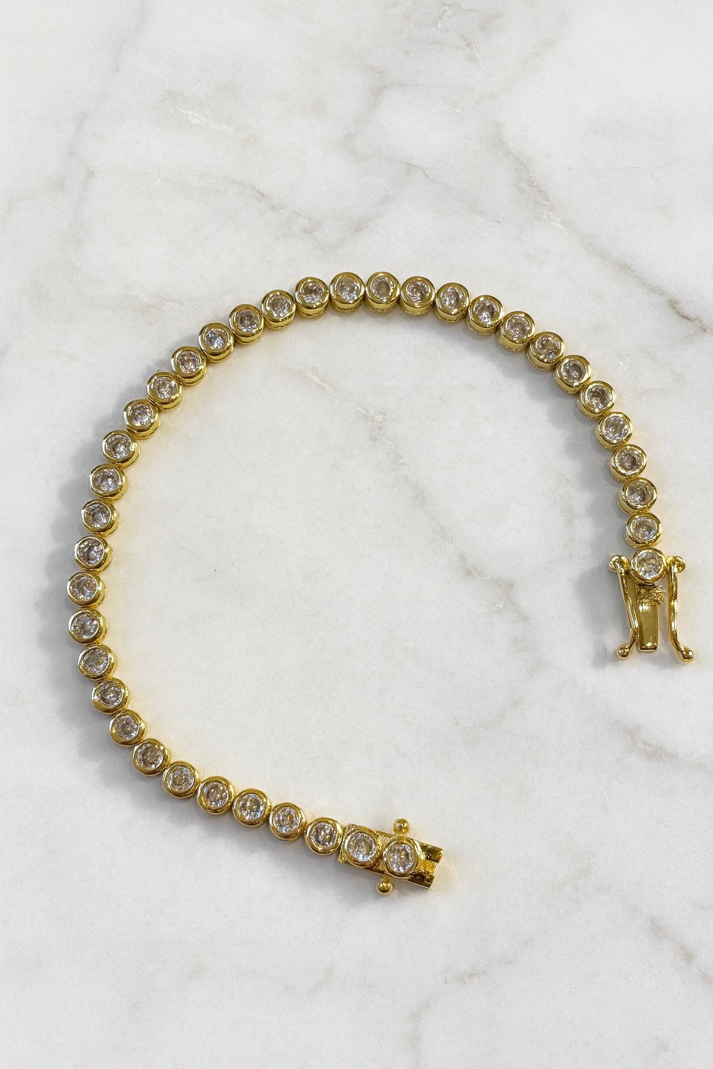 Signature gold tennis bracelet