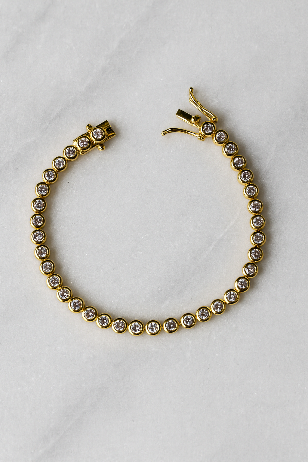 Signature gold tennis bracelet