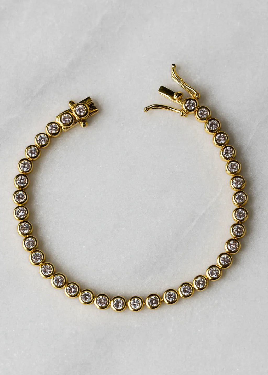 Signature gold tennis bracelet