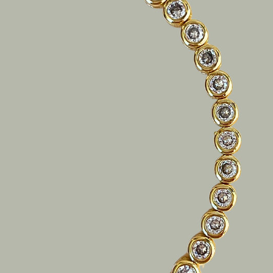 Signature gold tennis bracelet